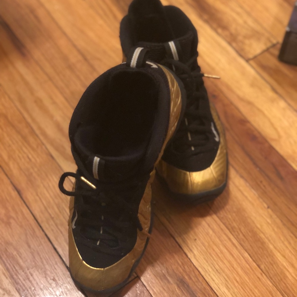 Gold Nike foams